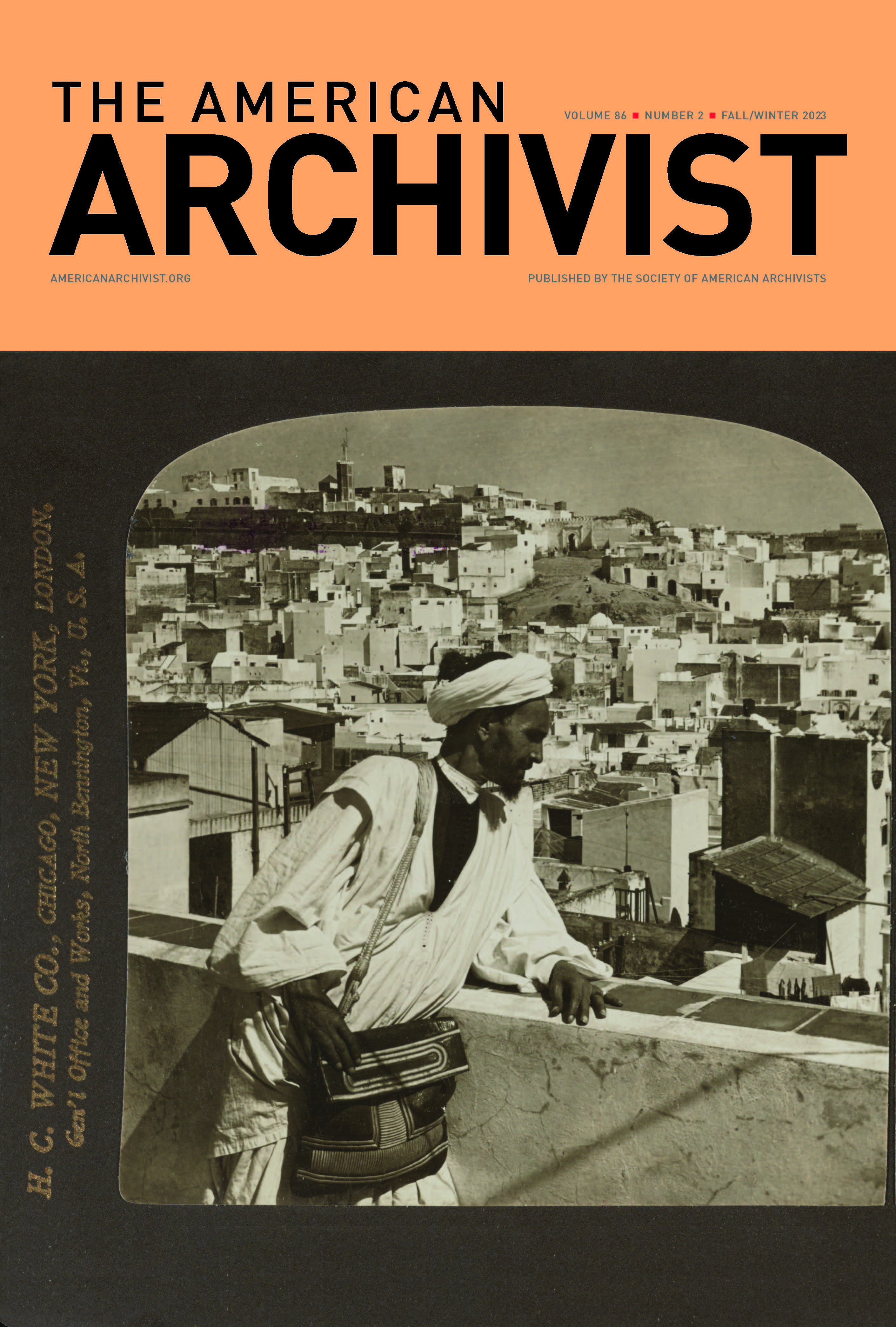 A man looks north from a housetop over Tangier to the Kasaba (Citadel) in Morocco.